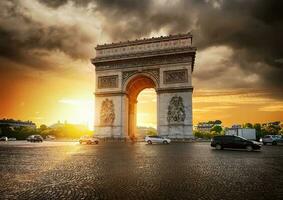 Cloudy sky and Arc de Triomphe photo