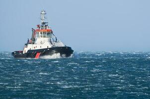 Tug Boat in a Rough Sea photo