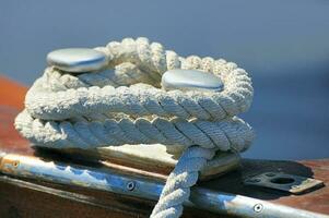 Rope Fasten to a Cleat on a Boat photo