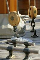 Close up of the Deck on a Old Wooden Sailboat photo