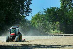 Plowing Time - Tractor Working photo