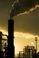 Industrial Plant with Chimney Smoking photo