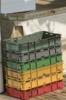 Colored Crates used to Stock Fishes photo