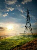 Electric pole and autumn field photo