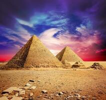 Pyramids and violet clouds photo