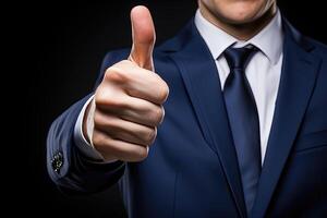 Businessman thumbs up gesture photo