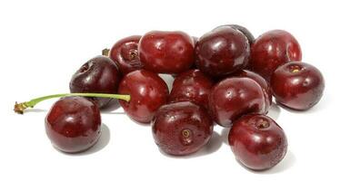 Ripe red cherry on a white isolated background photo