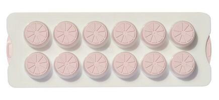 White plastic container for freezing ice or making round-shaped candies, top view photo