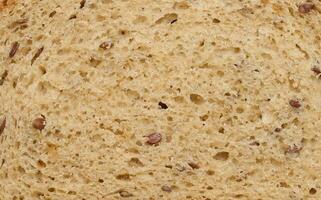 Texture of whole grain bread with seeds photo