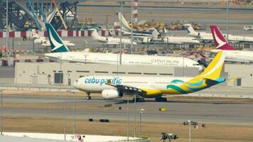 HONG KONG NOVEMBER 7, 2019 - Airbus A330 of Cebu Pacific Air taxiing down the taxiway to the runway at Chek Lap Kok Airport, Hong Kong. video