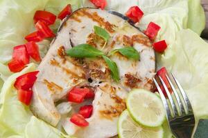 Grilled swordfish with fresh vegetables photo