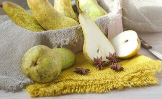 Green pears on a sackcloth photo