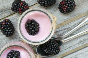 Homemade blackberry yogurt. Closeup photo
