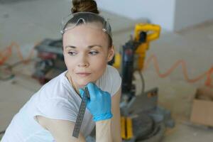 Young lady deals with wooden plinth photo