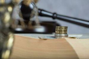 Coins on a book surface. photo