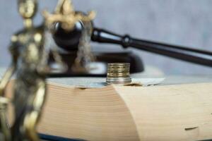 Coins on a book surface. photo