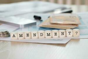 Word AMENDMENT composed of wooden letters. photo