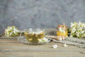 Glass cup of chestnut tea. Closeup photo