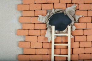 Hole in a brick wall. Top view photo