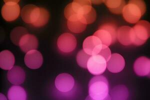 purple pink bokeh black background photo