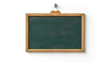 Empty green chalkboard with eraser and white chalk hang on the wall isolated. photo