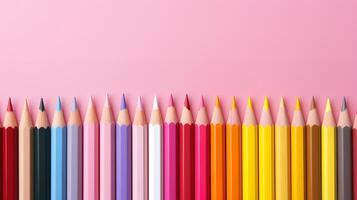 A lot of bright colored beautiful pencils on a bright and colorful background. photo