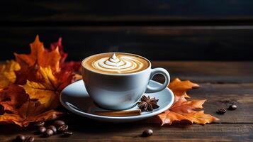 Coffee cup of cappuccino and marshmallows autumn leaves on surface old dark wood planks. photo