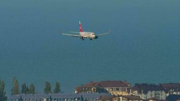 SOCHI, RUSSIA JULY 29, 2022 - Commercial plane boeing 737 of Nordwind landing at Sochi airport. Tourism and travel concept video