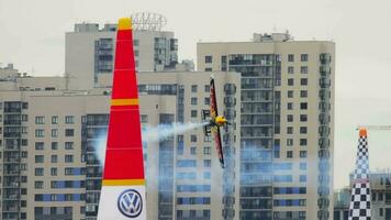 KAZAN, RUSSIAN FEDERATION, JUNE 14, 2019 - Sports plane performs extreme stunts flying in the air at Red Bull Air in Kazan video