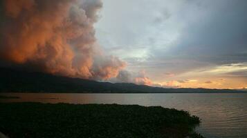 Golden clouds in the evening day with sunsets photo