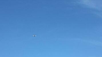 Airplane with a blue sky background photo