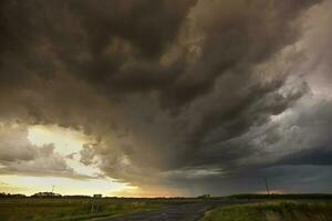 Stormy sky due to rain in the Argentine countryside, La Pampa province, Patagonia, Argentina. photo