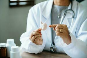 Female doctor holding Intestine in hand on right side.Healthcare hospital service concept stock photo