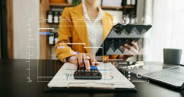Businesswoman hand Project manager working and update tasks and Gantt chart scheduling virtual diagram.with smart phone, tablet and laptop photo