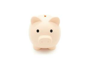 Piggy bank isolated on white background. Saving pig, small money box, planning home finances concept. photo