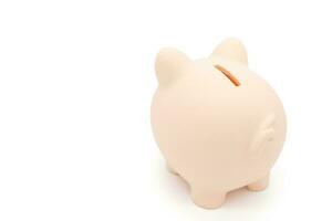 Piggy bank isolated on white background. Saving pig, small money box, planning home finances concept. photo