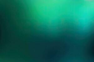 green abstract background with beautiful bokeh and rays of light photo
