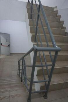 Access the building stairs for those who park under the building, go up from the bottom up or vice versa photo