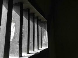 Photo of the air vents in my grandmother's house, black and white, similar to the ventilation in a prison