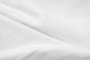 Soft focus white silk fabric texture background photo