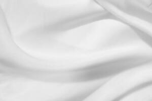 Soft focus white silk fabric texture background photo