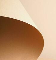 Colorful background from brown paper with shadow. Abstract geometric photo