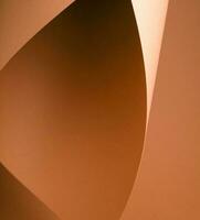 Colorful background from brown paper with shadow. Abstract geometric photo