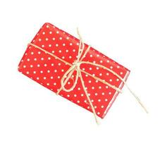 Top view of red gift with rustic ribbon, isolated. photo