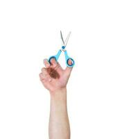 Man's arm raised holding a office supplies scissors. Isolate on white background. photo