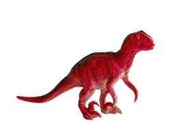 Small toy dinosaur, Velociraptor, isolated on blank background. photo