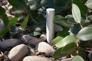 A mock-up of a tube of white cream with a lid on a background of eucalyptus leaves and stones. AI Generated photo