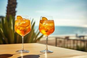 Two glasses with a cocktail and an orange with ice on the table. AI Generated photo