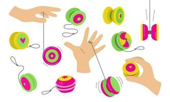 Isolated set of yo yo toys on a white background. The hand is playing with a toy. Fun and play. Vector flat illustration