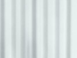 Blurry Light and shadows lines from curtain on the white wall. Sunny day with sun rays reflection from window. Element design for Mockup, Copy space for text photo